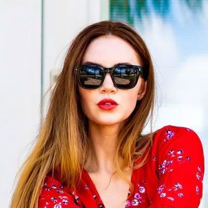 WOman Wearing Sunglasses Woman Wearing Sunglasses